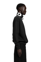 "BAD" Crewneck Sweater relaxed Unisex-Passform in Schwarz