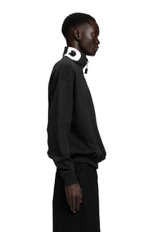 "BAD" Crewneck Sweater relaxed Unisex-Passform in Schwarz