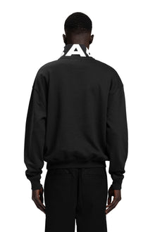 "BAD" Crewneck Sweater relaxed Unisex-Passform in Schwarz