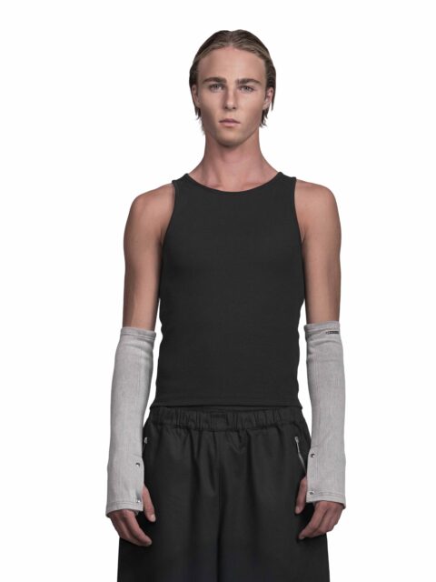 Cropped Front View of Model Moritz Ruediger wearing the Radius Arm Warmers Grey from BAD PORTIER's OPERATION AW25 capsule.