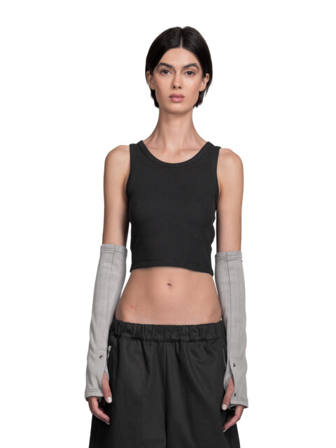 Cropped Front View of Model Vitoria Mota wearing the Radius Arm Warmers Grey from BAD PORTIER's OPERATION AW25 capsule.